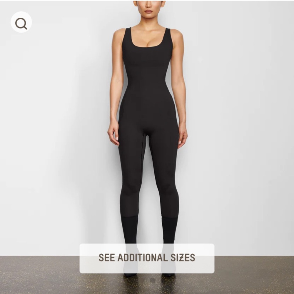 SKIMS ALL-IN-ONE SCOOP NECK ONESIE | ONYX